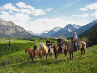 horseback by water shed